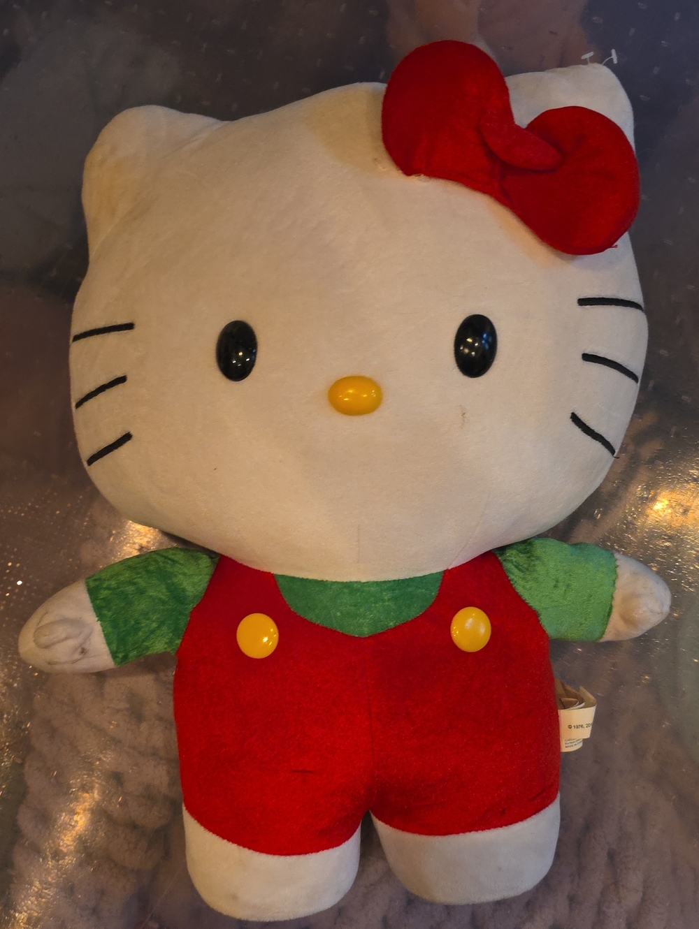 Hello Kitty Greeter Plush Toy in Red Overalls with Green Shirt